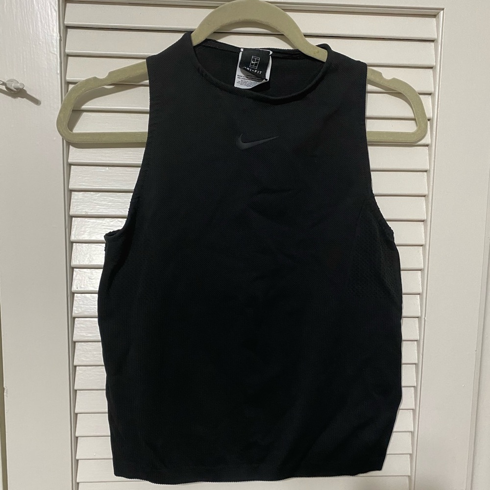 High-neck fitted Nike dry-fit shirt.